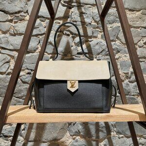 Louis Vuitton 2015 Black Vanilla Lockme MM Bag